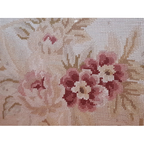 1630 - An early 20th century Aubusson style Tapestry wall hanging with clusters of flowers to centre and co... 