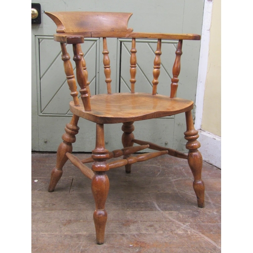 2687 - A Windsor captains chair principally in birch