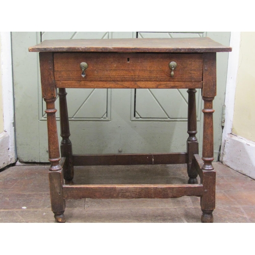 2715 - A Georgian oak country made cottage table fitted with a frieze drawer on turned supports, 70 cm wide