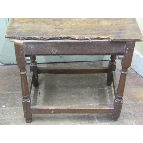 2715 - A Georgian oak country made cottage table fitted with a frieze drawer on turned supports, 70 cm wide