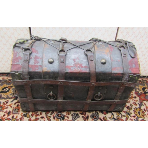 2722 - An antique style leather bound trunk with domed lid and further leather bindings, 40 cm in height (e... 