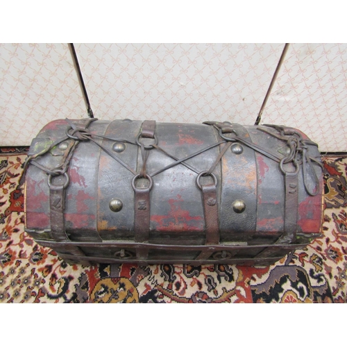 2722 - An antique style leather bound trunk with domed lid and further leather bindings, 40 cm in height (e... 