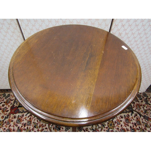 2724 - A 19th century mahogany occasional table the circular top on a turned pillar and tripod, 50 cm diame... 