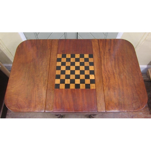 2729 - A 19th century mahogany drop leaf games table, the sliding and convertible top enclosing a chequer b... 