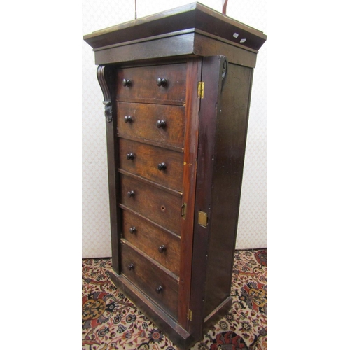 2730 - A Victorian mahogany Wellington chest of six graduated drawers with usual central locking mechanism,... 