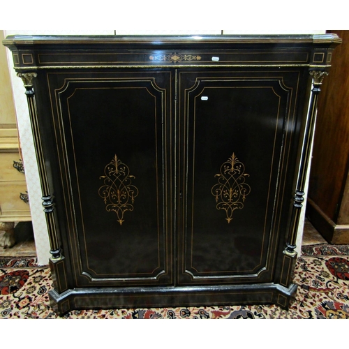 2732 - A mid Victorian period ebonised pier cabinet enclosed by two panelled doors within two reeded column... 