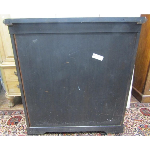 2732 - A mid Victorian period ebonised pier cabinet enclosed by two panelled doors within two reeded column... 