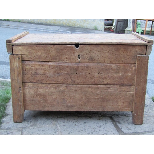 2754 - An antique riven oak coffer, 112cm wide