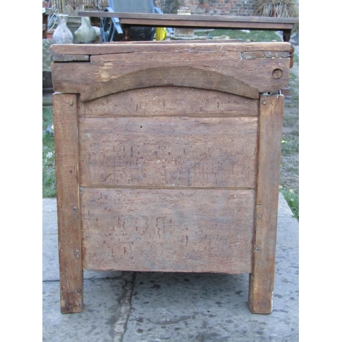 2754 - An antique riven oak coffer, 112cm wide