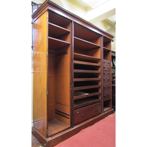 2756 - A good quality Georgian mahogany four door wardrobe, the interior comprehensively fitted with enclos... 