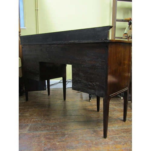 2768 - An inlaid Edwardian mahogany sideboard in the Georgian style, with serpentine outline, chequered str... 