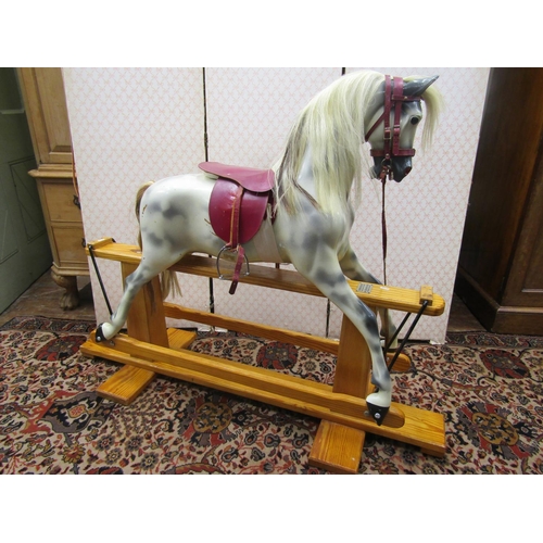 2769 - A contemporary dapple grey rocking horse by Haddon Rockers, of Wallingford, the horse with painted f... 