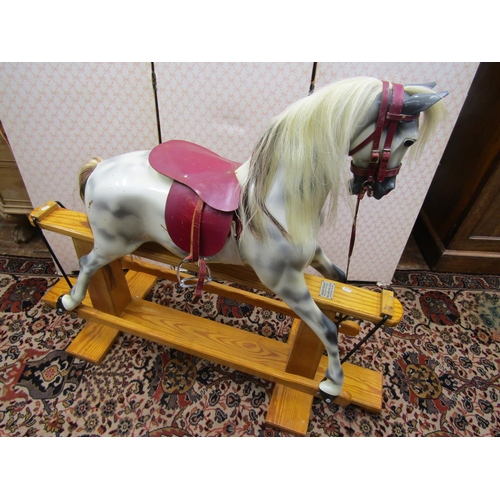 2769 - A contemporary dapple grey rocking horse by Haddon Rockers, of Wallingford, the horse with painted f... 