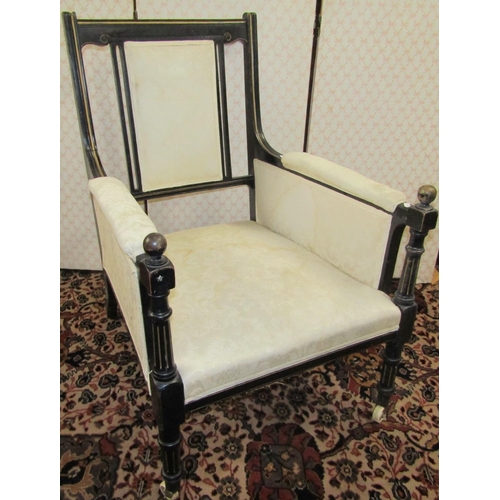 2770 - An aesthetic movement library of drawing room chair, with ebonised frame, gilt detail and upholstere... 