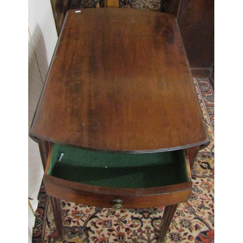 2797 - A 19th century mahogany oval Pembroke table with frieze drawer raised on square tapered supports