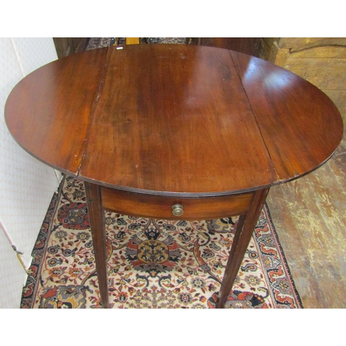 2797 - A 19th century mahogany oval Pembroke table with frieze drawer raised on square tapered supports