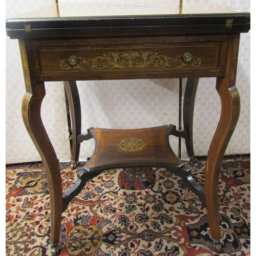 2806 - Edwardian Rosewood and marquetry envelope card table on shaped supports with under gallery