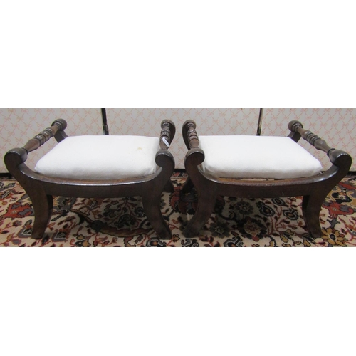 2808 - Pair of small regency mahogany footstools on shaped supports with upholstered tops