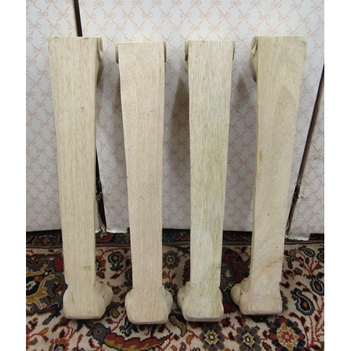 2691 - Four carved hardwood column supports with lion mask and lions paw feet, 58cm high