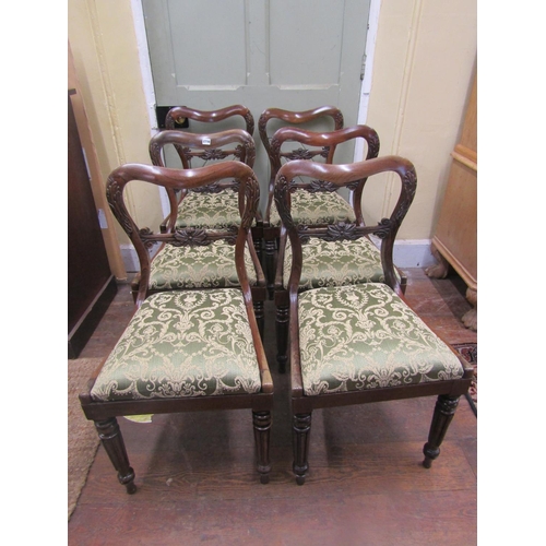 2716 - A set of six Regency rosewood dining chairs with drop in seats, carved detail on fluted forelegs