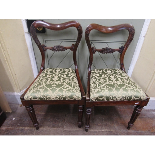 2716 - A set of six Regency rosewood dining chairs with drop in seats, carved detail on fluted forelegs