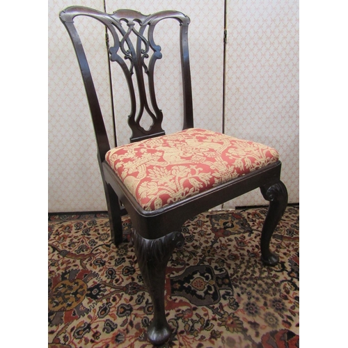 2773 - A Georgian mahogany side chair with yoke shaped cresting rail, carved and pierced splat, drop in sea... 