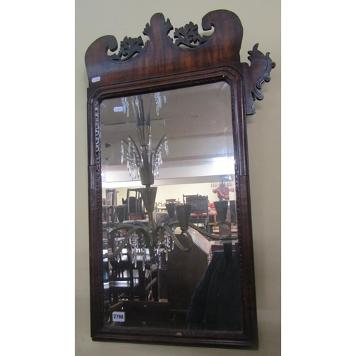 2798 - A Georgian mahogany Swansea type mirror the frame with fretted outline enclosing a bevelled edge mir... 