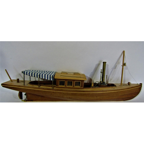 1710 - A miscellaneous collection of items including a model of the African Queen steam boat, two brass bee... 