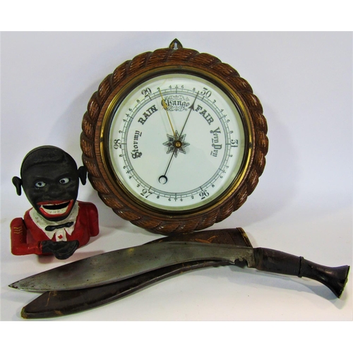 1720 - A miscellaneous collection of items including a wheel barometer, a Gurkha style dagger in a leather ... 