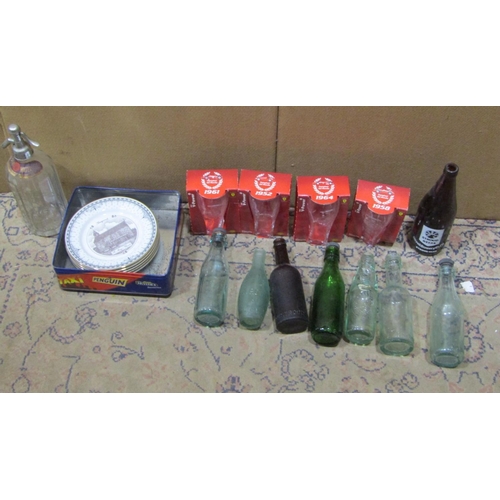 2128 - A small collection of vintage Stroud Brewery glass beer bottles, soda syphon, five limited edition c... 