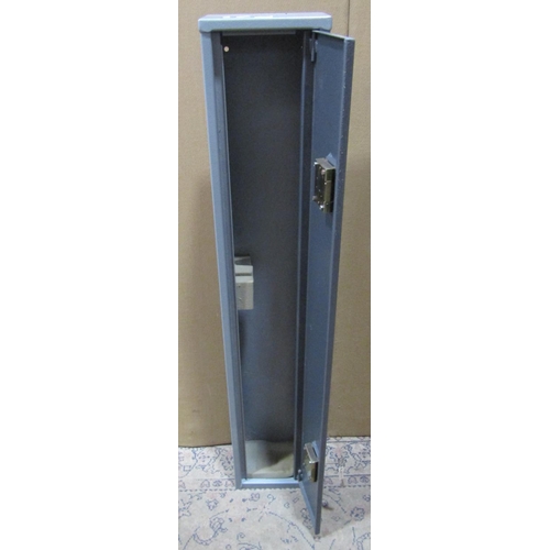 2133 - A steel gun cabinet enclosed by a full length door with two locks and keys, 24 cm wide x 15 cm deep ... 