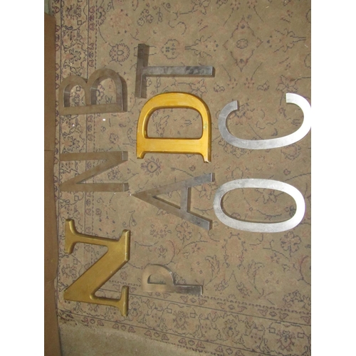 2152 - Two gilt painted wooden letters D & N together with seven steel letters