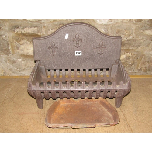 2165 - A small cast iron fire basket of rectangular form with removable arched back with fleur-de-lys detai... 