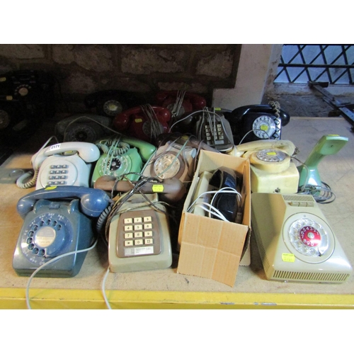 2171 - Thirteen assorted 1960s and 70s rotary and button telephones in various colours, some designed by Er... 