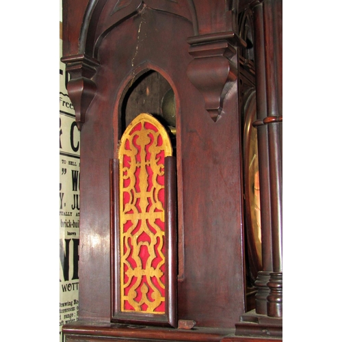 2675 - A most unusual Victorian gothic longcase clock, the case supported by four columns, the trunk with l... 