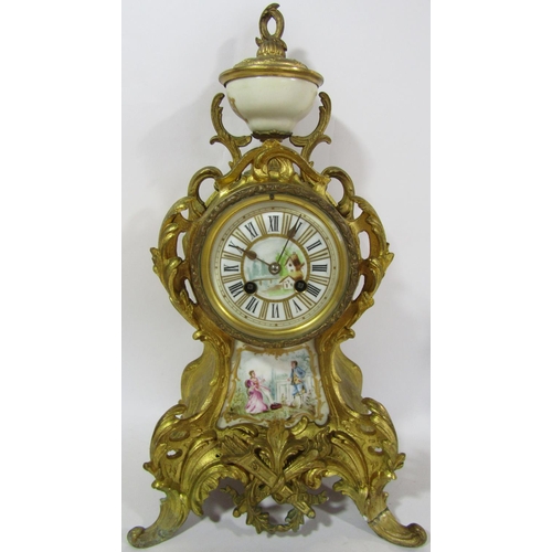 1492 - A 19th century French clock garniture with gilded finish porcelain panels and eight day striking mov... 