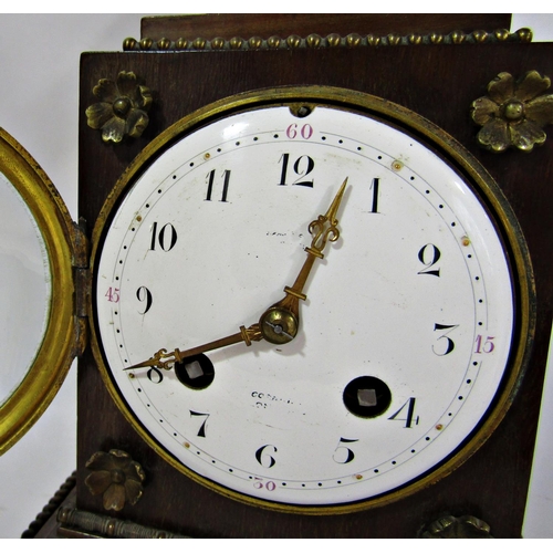 1494 - A 19th century French mantel clock, the timber case with applied brass mounts surmounted by a cocker... 