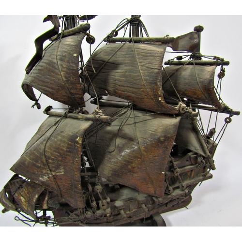 1802 - A vintage wooden model of a 16th century galleon in full  sail, raised on a wooden stand, 36cm x 50c... 