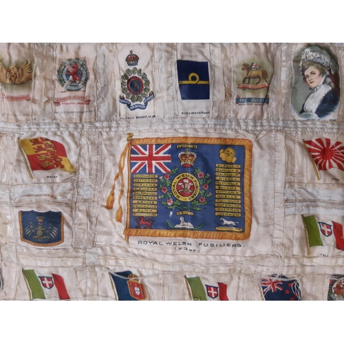 1633 - Early 20th century panel featuring a large collection of WW1 cigarette silks of regiments, flags, mi... 