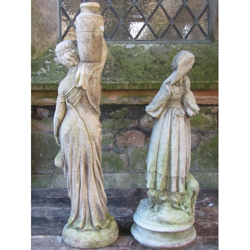 2006 - A weathered cast composition stone garden ornament in the form of a standing classical female water ... 