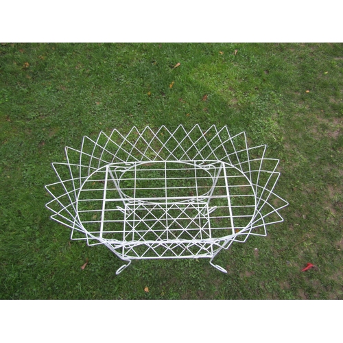 2033 - A Victorian style lattice wirework two tier garden/conservatory planter raised on simple scrolled su... 