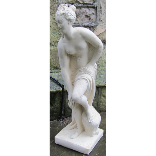 2039 - A composition stone garden ornament in the form of a classical maiden set on a square platform base,... 