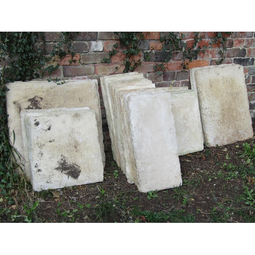 2042 - 21 composition stone paving slabs, varying size, largest examples 60 cm square