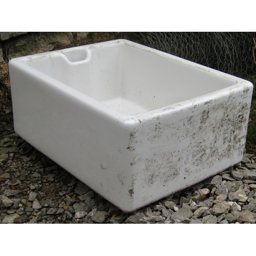 2045 - A reclaimed white glazed stoneware butlers sink 60 cm long x 46 cm wide x 26 cm high together with a... 