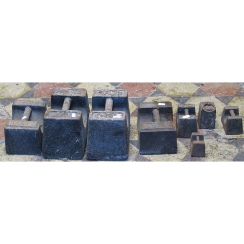 2085 - Eight cast iron weights, varying size, the largest 56lb