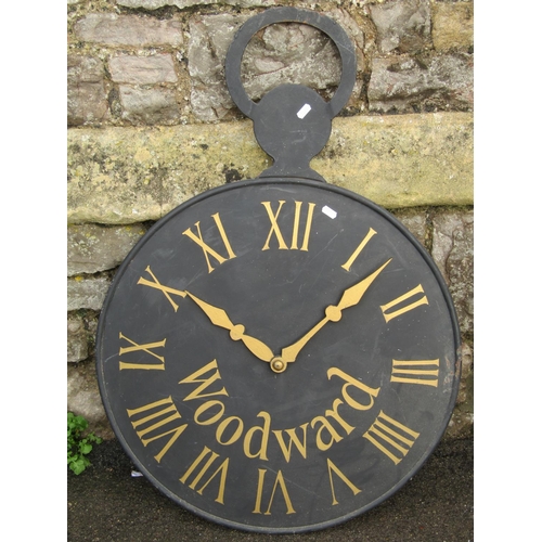 2101 - A decorative double sided cast iron sign, in the form of an outsized pocket watch, 62 cm diameter x ... 