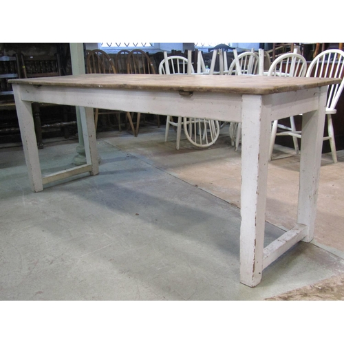 2211 - A pine scrub top kitchen table of rectangular form raised on painted square tapered supports partial... 