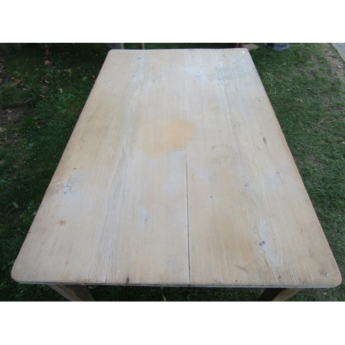 2221 - A 19th century stripped pine kitchen table of rectangular form raised on square tapered supports 152... 