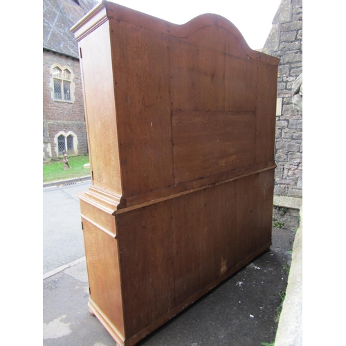 2260 - A substantial 19th century two sectional continental dresser enclosed by an arrangement of cupboards... 