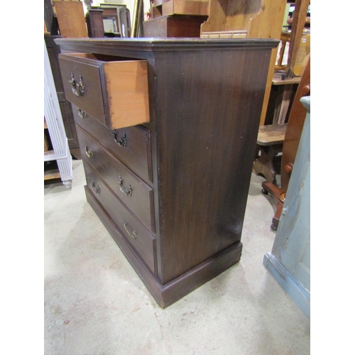 2320 - An Edwardian mahogany bedroom chest of three long and two short graduated drawers, with cast foliate... 